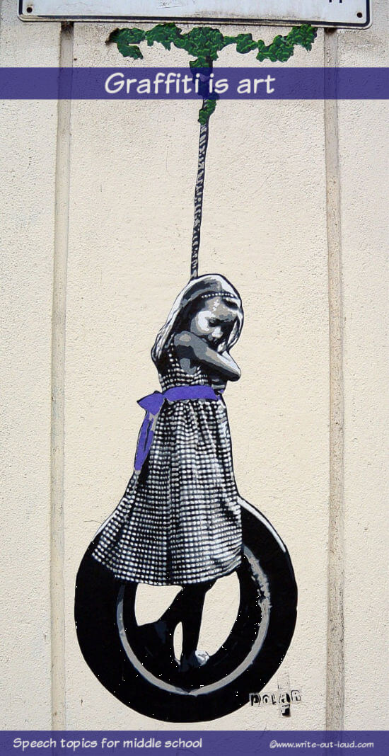 Image- street art- girl on a tire swing. Text: Graffiti is art.